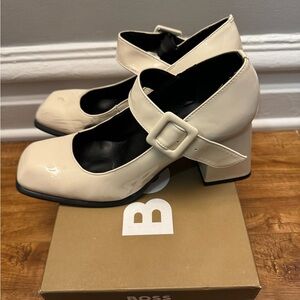 White buckle strap chunky pumps